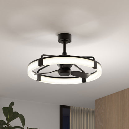Modern ceiling fan with a circular LED light fixture and black blades, mounted on a white ceiling. A plant and parts of wooden and glass decor are visible in the lower corners of the image.