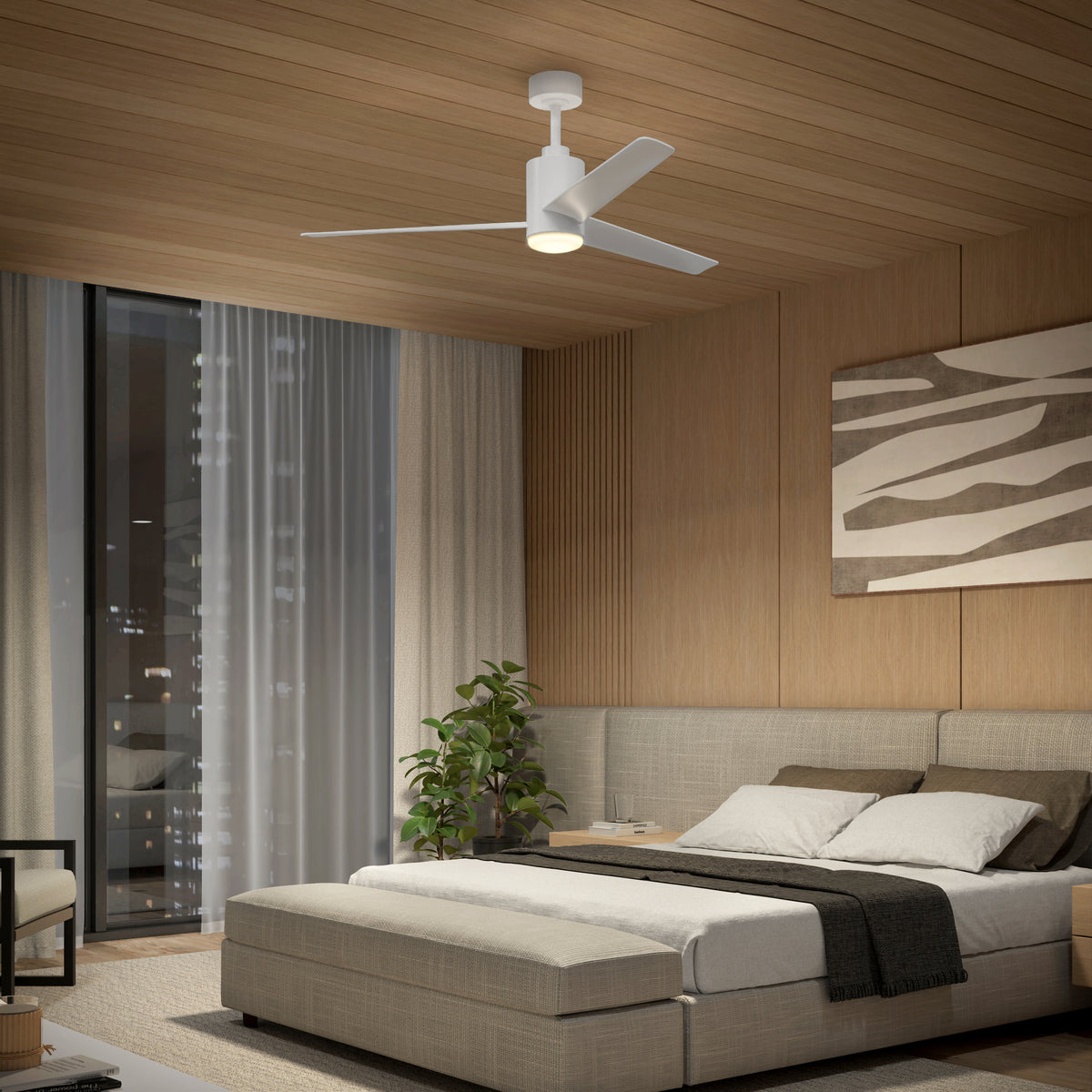 Modern bedroom with wood-paneled walls and ceiling, a double bed with neutral bedding, a potted plant, abstract wall art, large window with city view, and a white ceiling fan with light.