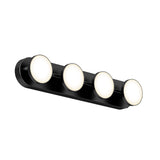 A modern black wall-mounted light fixture with four evenly spaced round LED lights glowing softly against a white background.