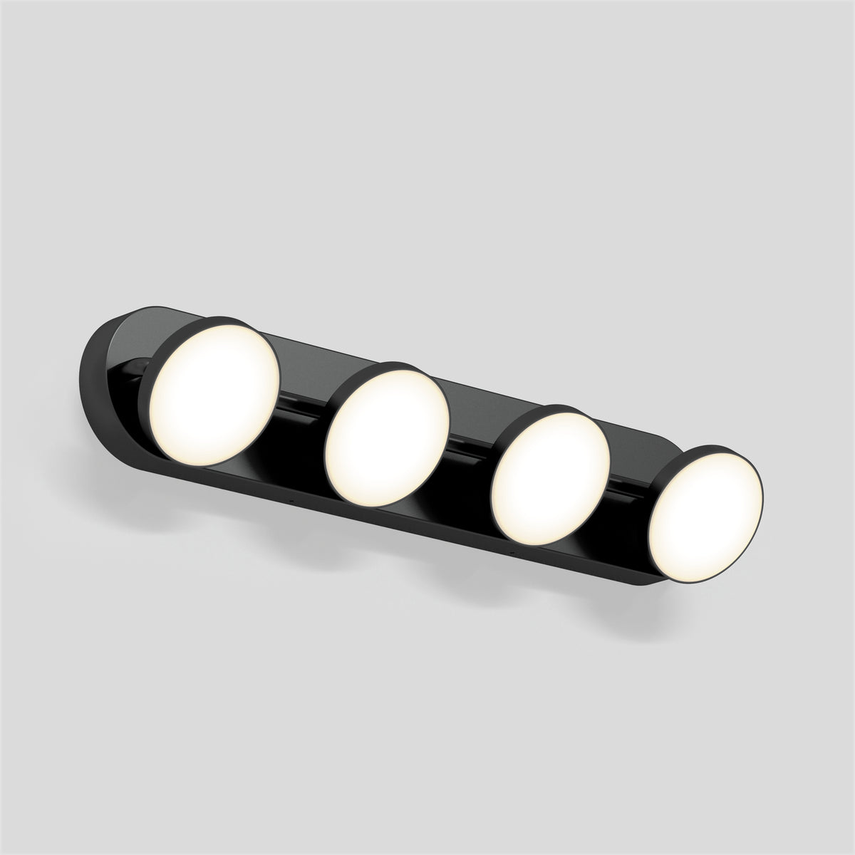 Artika Santori 27-in LED Vanity Light in matte black, with four round lights, shown illuminated on a plain gray background.