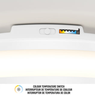 Close-up of Artika Hemisphere 15 in. LED’s 5 CCT switch, showing adjustable color temperature from warm to cool on the ceiling light.