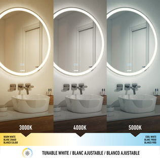 The Artika Mateo 28 in. LED mirror with defogger is shown in three color temperatures: warm white (3000K), neutral white (4000K), and cool white (5000K), each casting different tones on the sink and wall.