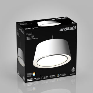 A black Artika box showcases the Cappa LED pendant light 3 CCT, featuring a modern circular design in white and silver with soft illumination. Product features and details are printed on the packaging.