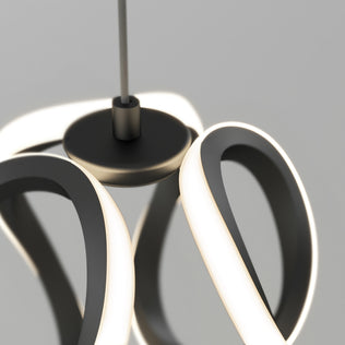 Close-up of the Artika Vivaldi LED pendant light 3 CCT, featuring smooth, intertwined illuminated loops and a central black circular base, suspended by a thin rod against a plain gray background.