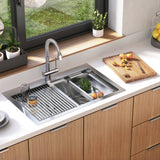 Modern kitchen with a stainless steel sink, drying rack with glasses, cutting board with sliced apricots, potted plants on the windowsill, and lemons in a glass bowl on a white countertop.