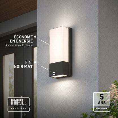 Artika Dixon indoor-outdoor LED wall light in matte black on a textured wall, featuring energy-saving performance and a 5-year warranty.
