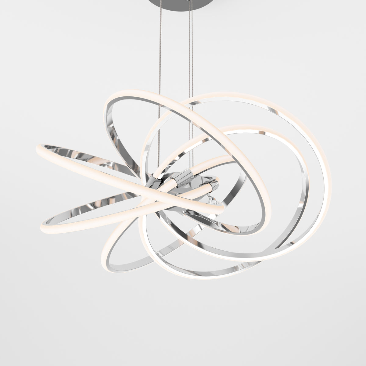 A modern ceiling light fixture with interlocking, illuminated rings in a chrome finish, suspended by thin cables against a plain white background.