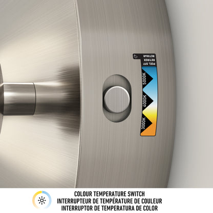 A close-up of a brushed metal light fixture with a circular button and a color temperature switch label showing settings for 3000K, 4000K, and 5000K. Text below reads Colour Temperature Switch in three languages.