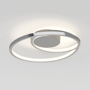 The Artika Salto LED flush mount light features two overlapping circular rings and a central disc, casting a soft, even glow on the ceiling for a modern look.