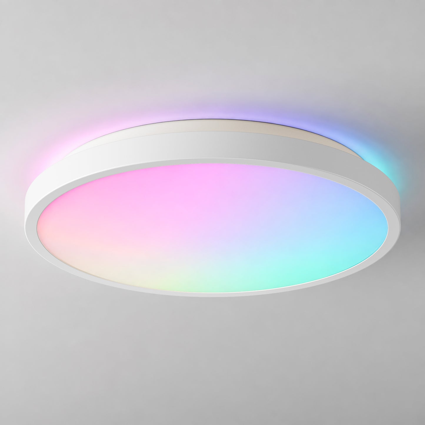 Artika’s Isara 12″ RGBIC LED ceiling light softly glows in pink, blue, and green against a neutral background.