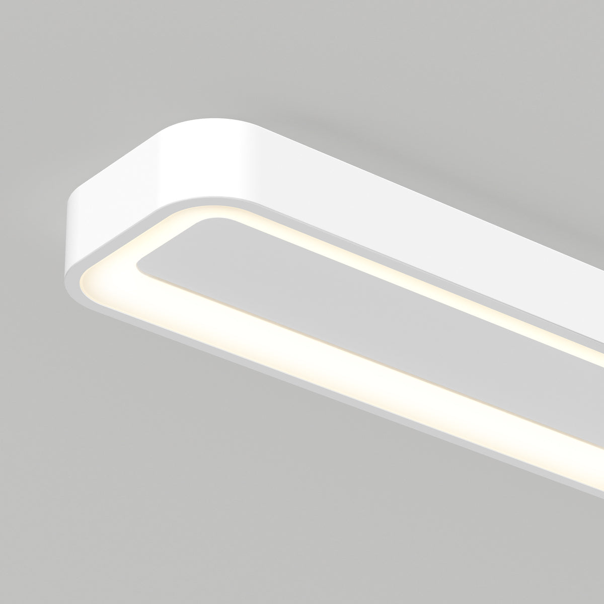 The Artika Aiden 48 in. LED modern flush mount light features a sleek rectangular design with rounded corners and 5 CCT options, casting a soft, even glow against a plain light gray background.
