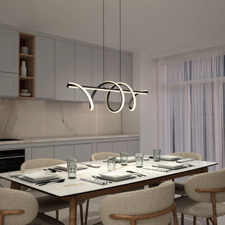 A modern dining room with a marble table for six, upholstered chairs, minimalist kitchen cabinets, and the Artika Coda modern LED pendant light 5 CCT hanging above. Sheer curtains allow natural light to fill the space.