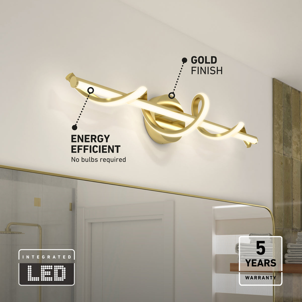 Modern gold-finished, integrated LED light fixture with a unique twisted design mounted above a bathroom mirror. Labels highlight its energy efficiency and 5-year warranty. Shelves and a shower are visible in the background.