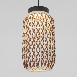 The Artika Benson Mini LED pendant light 5 CCT features a cylindrical shade with brown and white rattan weave in a lattice pattern, allowing warm light to shine through. It hangs elegantly from a black cord.