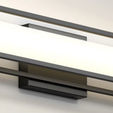 A modern wall-mounted light fixture with a rectangular black base and a horizontal frosted glass shade emitting soft white light. The design is sleek and minimalist, suitable for contemporary interiors.