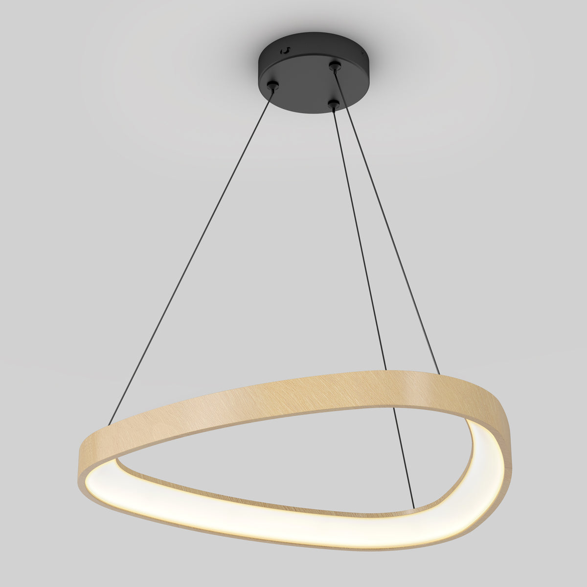 A modern, oval-shaped pendant light with a wooden finish hangs from the ceiling by three thin black cords, emitting a soft white glow.