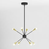 Modern sputnik chandelier with a black central sphere, eight black arms, gold accents, and round white bulb covers, hanging from a black stem against a plain white ceiling.