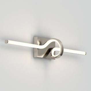 The Artika Bowtie modern LED bathroom vanity light 5 CCT is a dimmable fixture with a metallic base and looping bar, ideal for white walls.