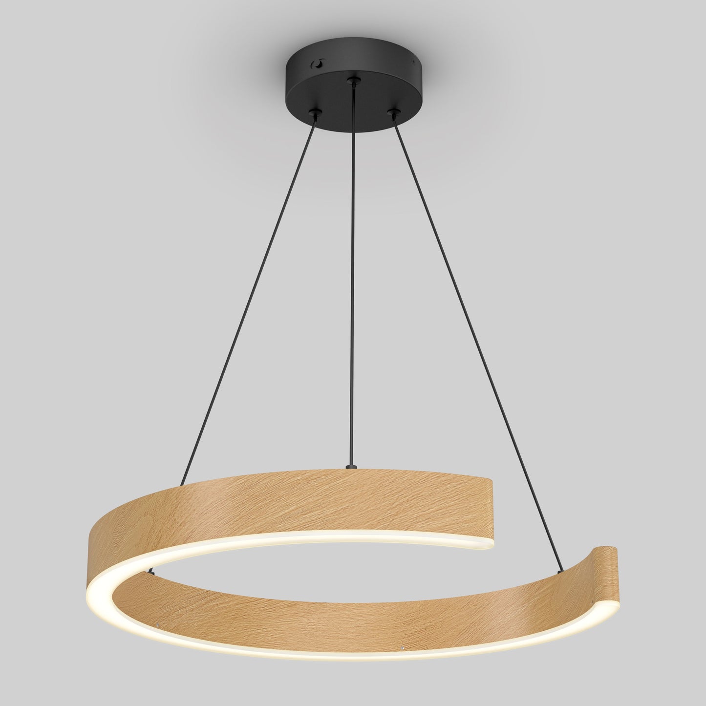 The Artika-CAN-dev Vance modern LED pendant light 3 CCT features a suspended curved wooden ring with integrated lighting, hanging from a black ceiling mount by three black cables against a gray background.