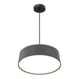 A modern, round pendant ceiling light with a ribbed black shade and a white glowing underside, suspended from a thin black rod and circular ceiling mount.