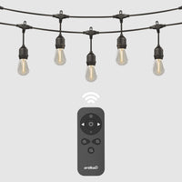 The Eclipse Solar String Light with Remote by Artika features five hanging bulbs and comes with a black remote control for power, brightness, and timer settings. A wireless icon highlights its convenient remote operation.