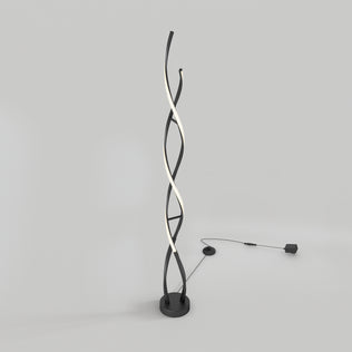 Artika Swirl modern LED floor lamp with twisted black and white strips on round base, plugged in against a plain background.