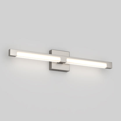 The Artika Tivoli modern LED bathroom vanity light 5 CCT is a sleek, rectangular wall-mounted fixture with a brushed metal finish, emitting soft white light from its square base on a plain, light gray wall.