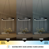 A modern ring-shaped pendant light above a dining table is shown in three lighting temperatures: 3000K warm white, 4000K neutral white, and 5000K cool white. Text below highlights “Selectable White” in three languages.