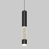 A modern pendant light with a cylindrical black metal body and a clear section filled with small bubbles, suspended from a thin black cord against a plain gray background.