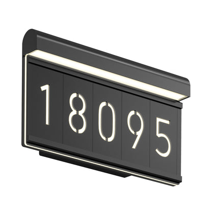 The Artika Bowen modern LED outdoor address wall light 5 CCT displays the numbers 18095 in large illuminated white digits on a sleek black rectangular frame, with integrated top-edge lighting for clear visibility.