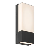 A modern rectangular wall sconce with a black metal base and a frosted white glass shade, mounted vertically and emitting soft, diffused light.