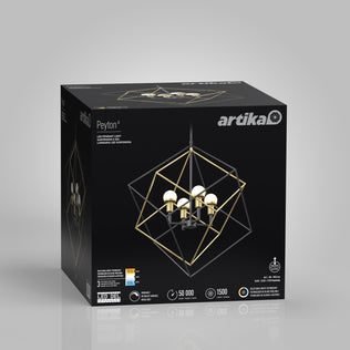 A black box labeled “Peyton LED modern mid-century pendant light” by Artika features a gold and black geometric chandelier image, highlights its 1500 lumens brightness, 50,000-hour LED lifespan, and eco-friendly design on the front.