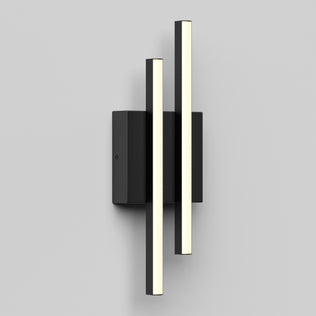 The Artika Grid indoor-outdoor LED wall light features two vertical cylindrical bars on a rectangular black base, showcased against a plain light gray background.
