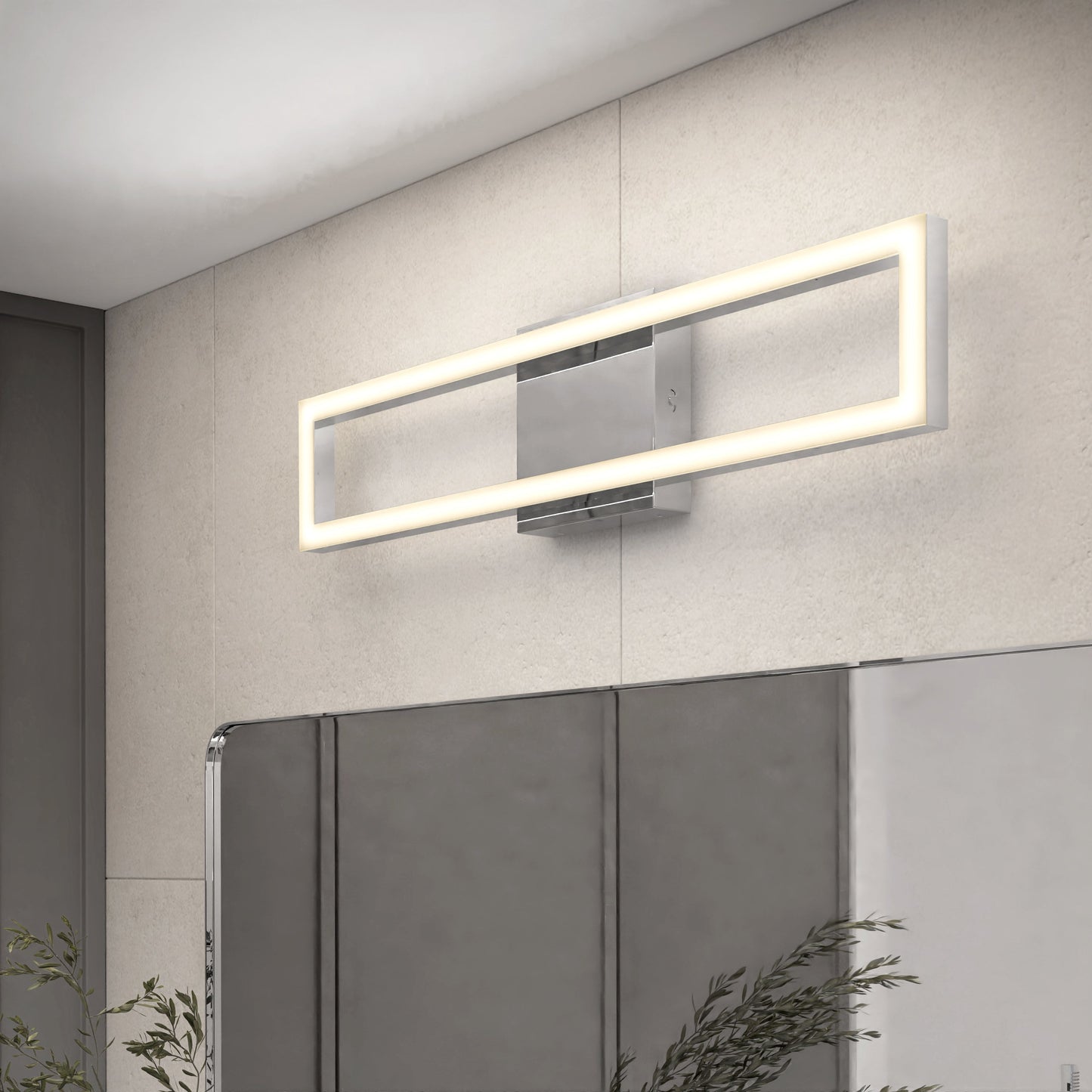 The Dover modern LED bathroom vanity light 5 CCT by Artika-CAN-dev, with a sleek chrome base, is mounted above a mirror on light tiles in a minimalistic bathroom interior, complemented by plants in the corner.