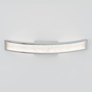 The Artika Glitter 27-in (69 cm) Integrated LED Vanity Light Bar features a sleek chrome finish and a textured, illuminated panel, adding modern elegance when mounted on a plain white bathroom wall.