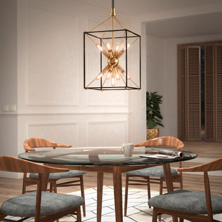 A modern dining room with a round glass table, four wooden chairs, and the Artika Clyde 9-light pendant above.