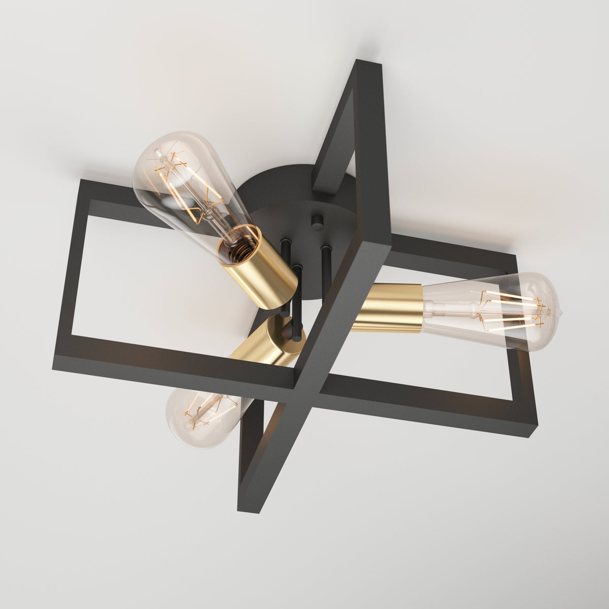 The Artika Holt 3-light flush mount features three exposed bulbs with gold sockets, intersected by black rectangular frames, and mounts directly to the ceiling.