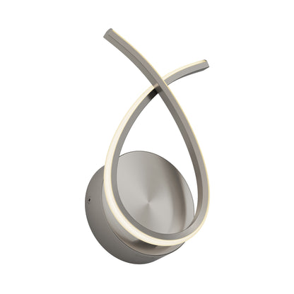 The Artika Gamma modern LED wall sconce 5 CCT features a circular base and two intersecting curved LED strips, all finished in brushed metal.