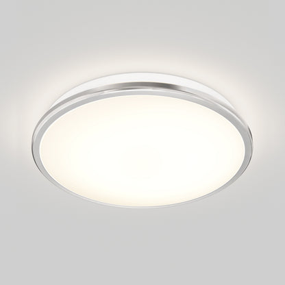 The Artika Vera 13 in. LED modern flush mount light features a white frosted cover and chrome finish, casting a soft, even glow across a plain light gray ceiling.
