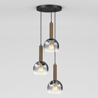 The Ardel Spiral 3-Light Pendant by Artika features three clear glass globes suspended by black cords with wooden accents from a round black ceiling mount; bulbs not included.