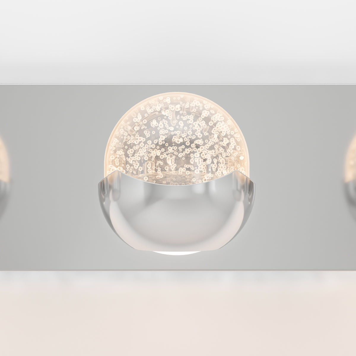 The Artika Oracle modern LED bathroom vanity light features half-chrome, half-textured glass for a sleek, softly glowing look.
