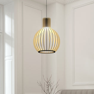 The Artika Tomi LED Pendant Light 3 CCT, featuring a modern black wireframe spherical design, hangs in a bright, minimalist room with white paneled walls and a tall window. A bare branch is visible in the foreground.