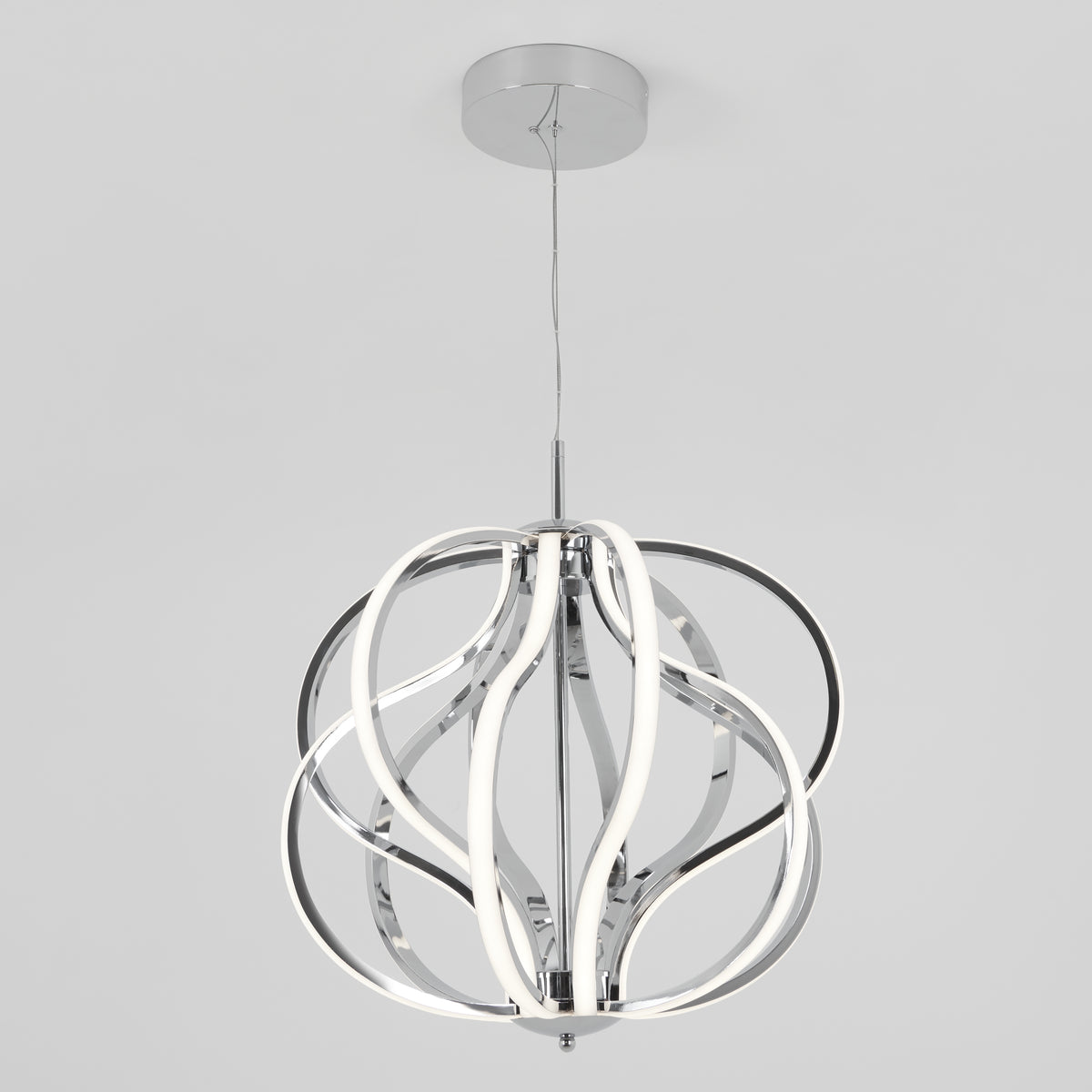 The Meridian LED pendant light by Artika showcases a chrome finish and curved, intertwined LED strips, suspended from a round mount by a slim cord against a plain white background.