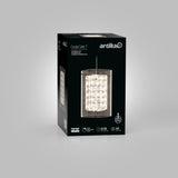 A black box packaging of the Artika Crystal Cube 1 light fixture, featuring an image of the crystal pendant light on the front, product specs, and branding on a gray background.
