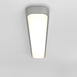 A modern, rectangular ceiling light fixture with rounded edges, mounted on a white ceiling and emitting a bright, even glow.