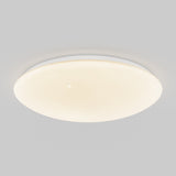 A round, flush-mounted ceiling light with a smooth, frosted white cover emits a soft, warm glow, featuring tiny, evenly distributed specks that resemble subtle stars. The background is a plain light gray.