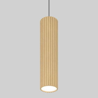 The Artika Groove LED modern pendant light 3 CCT features a cylindrical, vertically ridged wood-finish shade hanging from a black cord. Its bottom opening reveals a white interior, making it ideal kitchen island lighting against any backdrop.