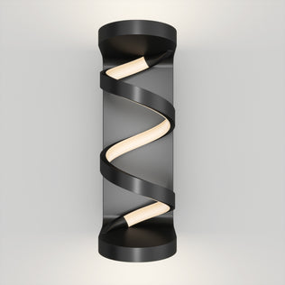 The Artika Swirl indoor-outdoor LED wall light features a modern black spiral design with a glowing white strip winding around its cylindrical form, shown mounted on a plain light gray wall.