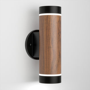 The Artika C7 indoor-outdoor LED wall light 3 CCT features a cylindrical design with a wood grain finish, black end caps, top and bottom lighting, and is mounted on a round black wall plate against a white background.