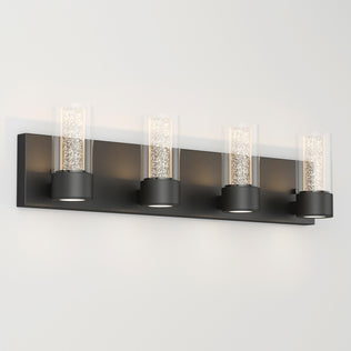 Artika Essence 27-in LED Vanity Light: a sleek, modern 1-light bathroom fixture with a rectangular black base and sparkling glass shade.